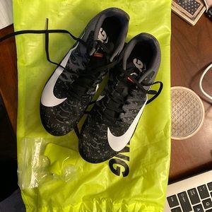 Nike Womens track shoes. Used maybe once or twice. Smoke free home